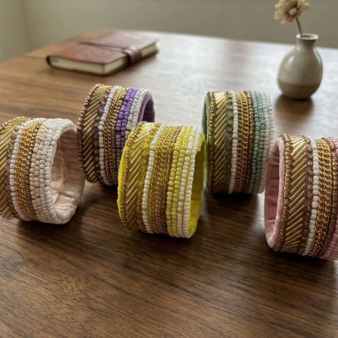 Handcrafted Yellow Beaded Bracelet with Gold Thread Detailing