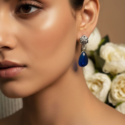 Antique Silver Floral Drop Earrings with Deep Blue Teardrop Stone