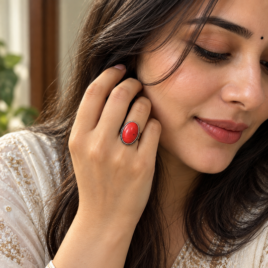 Elegant Close-Up Portrait with Statement Red Ring