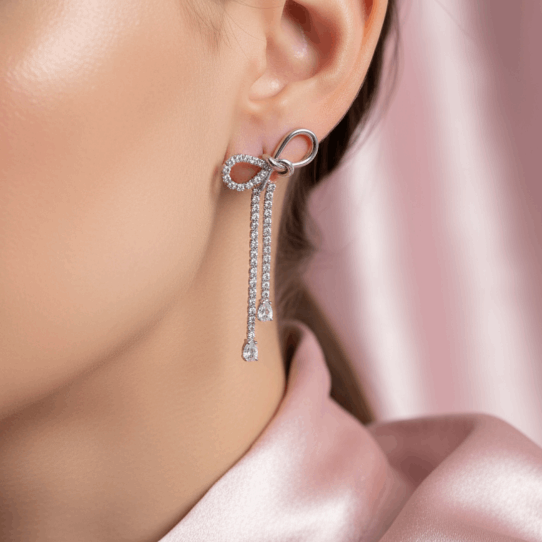 Silver Bow Dangle CZ Earrings