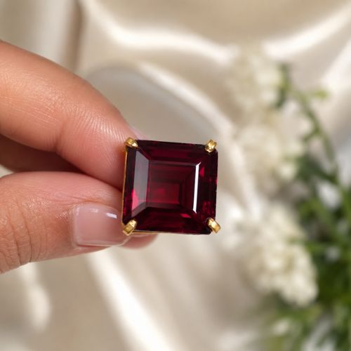 Gold-Trimmed Deep Burgundy Gemstone Ring