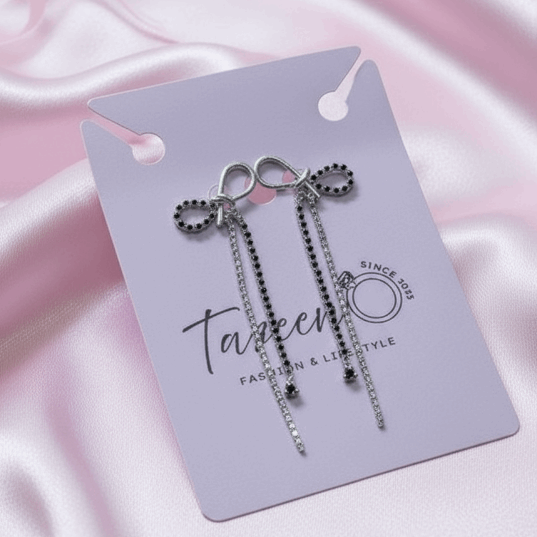 Silver Bow Dangle CZ Earrings