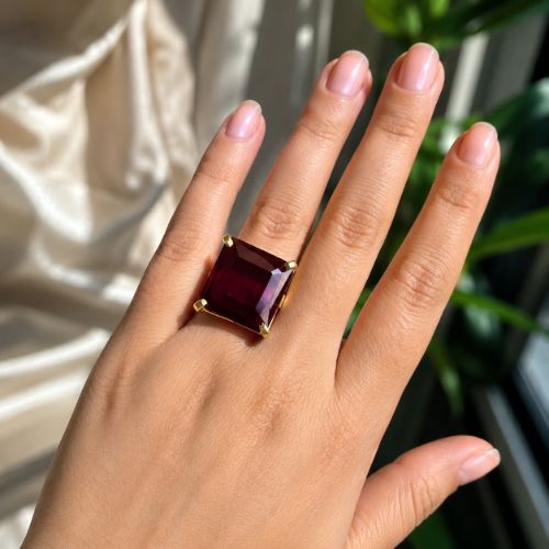 Gold-Trimmed Deep Burgundy Gemstone Ring