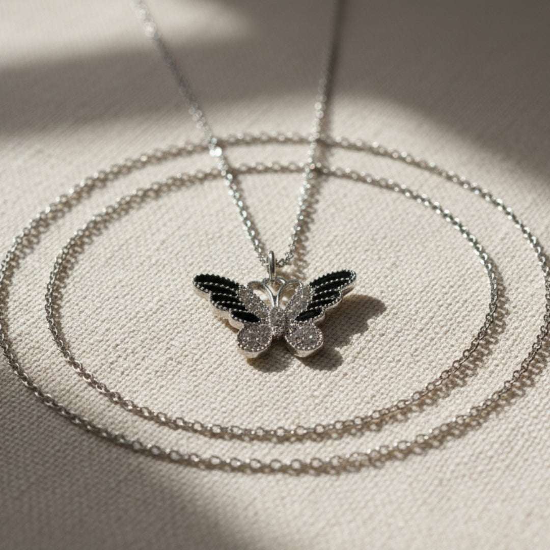 Silver Butterfly Pendant Necklace – Black & White Enamel