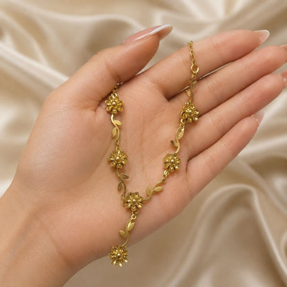 Elegant Gold Floral Y Necklace with Leaf and Flower Charms – Statement Jewelry