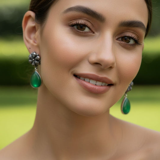 Antique Silver Floral Drop Earrings with Green Teardrop Stone