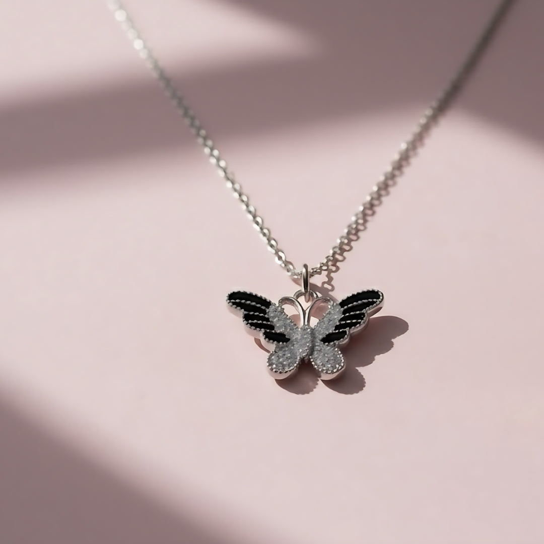 Silver Butterfly Pendant Necklace – Black & White Enamel
