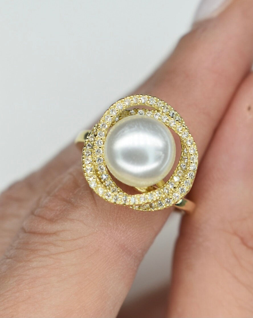Gold Ring With Pearl And Crystal Halo