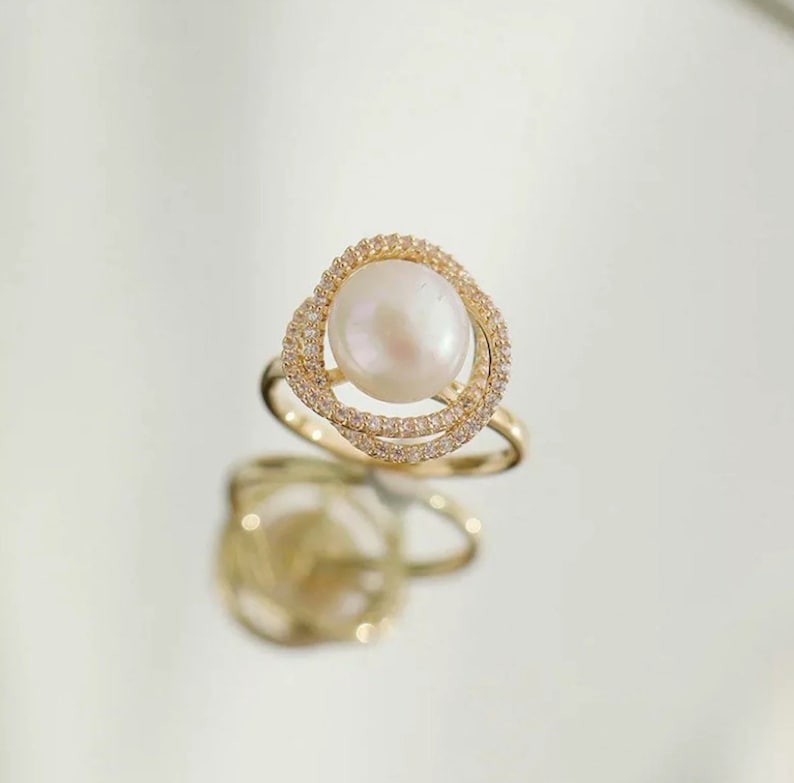 Gold Ring With Pearl And Crystal Halo