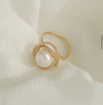 Gold Ring With Pearl And Crystal Halo