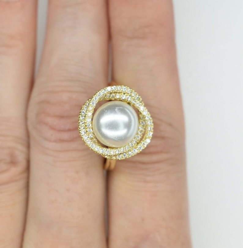 Gold Ring With Pearl And Crystal Halo
